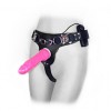 Vibrating strap on dildo.