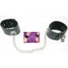 faux leather wrist and ankle cuffs.