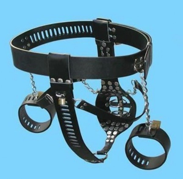 male chastity belt with wrist cuffs.